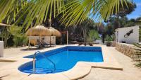 The swimming pool at or close to Casa Caledonia - Appartement dans villa avec jardin arboré et piscine à 500 M de la mer