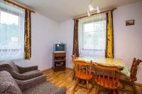 TV a/nebo společenská místnost v ubytování Apartments Večerník Rokytnice
