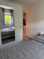 Postel nebo postele na pokoji v ubytování Paradiseresidency