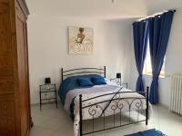 Posteľ alebo postele v izbe v ubytovaní Maison de 1 a 8 personnes entièrement rénovée