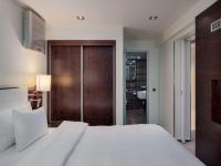 Postel nebo postele na pokoji v ubytování Radisson Blu Hotel Olümpia