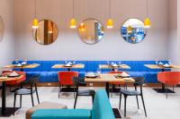 Χώρος καθιστικού στο Tru By Hilton Chillan Ferrat