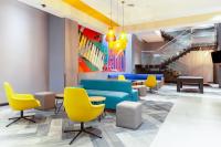 Χώρος καθιστικού στο Tru By Hilton Chillan Ferrat