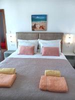 Postel nebo postele na pokoji v ubytování Apartmani Braut