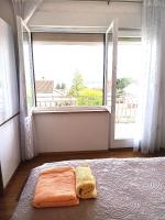 Postel nebo postele na pokoji v ubytování Apartmani Braut