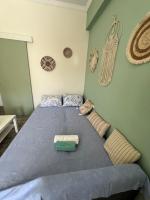 Posteľ alebo postele v izbe v ubytovaní SERENITY yard apartment