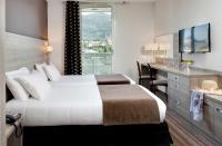 Hôtel Beau Siteにあるベッド