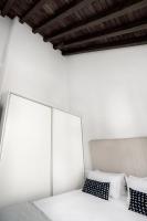 Postel nebo postele na pokoji v ubytování Suites Campo del Príncipe