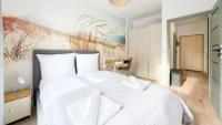 Posteľ alebo postele v izbe v ubytovaní Apartamenty Sun & Snow Let's Sea Baltic Park