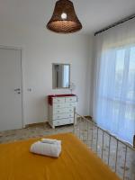A bed or beds in a room at Il Vicolo Palinuro