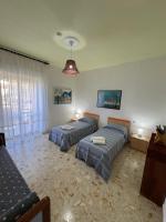 A bed or beds in a room at Il Vicolo Palinuro