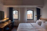 Posteľ alebo postele v izbe v ubytovaní Radisson Hotel & Suites, Gdansk, Wyspa Spichrzów