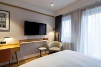 Televízia a/alebo spoločenská miestnosť v ubytovaní Radisson Hotel & Suites, Gdansk, Wyspa Spichrzów