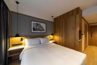 Posteľ alebo postele v izbe v ubytovaní Radisson Hotel & Suites, Gdansk, Wyspa Spichrzów