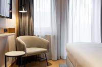 Posteľ alebo postele v izbe v ubytovaní Radisson Hotel & Suites, Gdansk, Wyspa Spichrzów