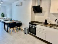 Kuchyň nebo kuchyňský kout v ubytování Apartamento Martin