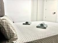 Postel nebo postele na pokoji v ubytování Apartamento Martin