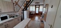 Kuchyňa alebo kuchynka v ubytovaní For You Apartman Gyula