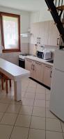 Kuchyňa alebo kuchynka v ubytovaní For You Apartman Gyula