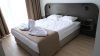 Postel nebo postele na pokoji v ubytování PARK DEMİRKAPI HOTEL