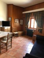 Televízia a/alebo spoločenská miestnosť v ubytovaní Casa Dell'Orso