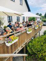 Oaspeți care stau la Gershøj Kro & Strand Hotel