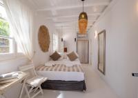 Posteľ alebo postele v izbe v ubytovaní Manu Mykonos Next to the Beach Quality Brand Villa & Bungalows