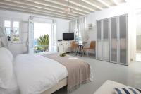 Posteľ alebo postele v izbe v ubytovaní Manu Mykonos Next to the Beach Quality Brand Villa & Bungalows