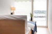 Posteľ alebo postele v izbe v ubytovaní Apartament Słoneczny Gródek 30