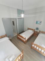 Posteľ alebo postele v izbe v ubytovaní Apartments Konstantinidis