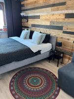 Posteľ alebo postele v izbe v ubytovaní Apartament nad Wilgą