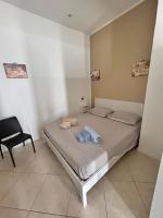 A bed or beds in a room at Leam Apartment 5