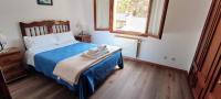 Postel nebo postele na pokoji v ubytování Apartamentos Rurales La Tablá
