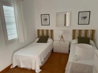 Postel nebo postele na pokoji v ubytování Menorca Villa Fenicia