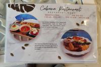 Una señal para un restaurante con comida. en The Mark Resort Cebu, en Lapu Lapu City