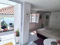 Posteľ alebo postele v izbe v ubytovaní Indy's Beach Apartments