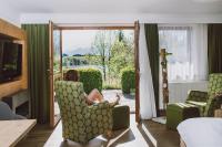 Posezení v ubytování Dreimäderlhaus - Das vegetarische Boutique Hotel