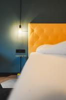 Łóżko lub łóżka w pokoju w obiekcie Boutique House happYellow Saalbach, inkl JokerCard