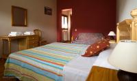 Postel nebo postele na pokoji v ubytování Albergue Casa Salinas