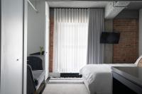 Maison Sainte-Thérèse By Maisons & coにあるテレビまたはエンターテインメントセンター