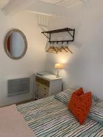 Ein Bett oder Betten in einem Zimmer der Unterkunft Le Petit Chene