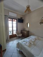 Posteľ alebo postele v izbe v ubytovaní Eleana apartments and studios