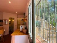 A kitchen or kitchenette at T1· Family Getaway 50m from the Beach