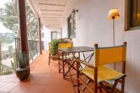 A balcony or terrace at T1· Family Getaway 50m from the Beach