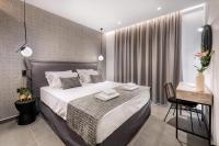 Posteľ alebo postele v izbe v ubytovaní Sensational Dubrovnik Villa Villa Filia 6 Bedrooms Overlooking Dubrovnik City Walls Old Town