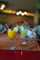 a group of three cocktails sitting on a table at SEL Nibash Hotel & Serviced Apartments in Dhaka