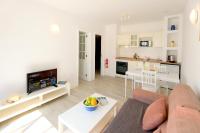 Kuchnia lub aneks kuchenny w obiekcie Salmarina Bungalows