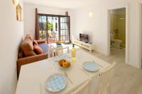 Telewizja i/lub zestaw kina domowego w obiekcie Salmarina Bungalows