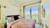 Postel nebo postele na pokoji v ubytování Mountain view Ras Elhikma - 134B Paros Villa -North Coast