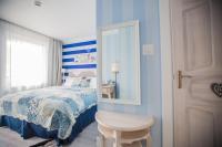 Łóżko lub łóżka w pokoju w obiekcie Hotel Ottaviano